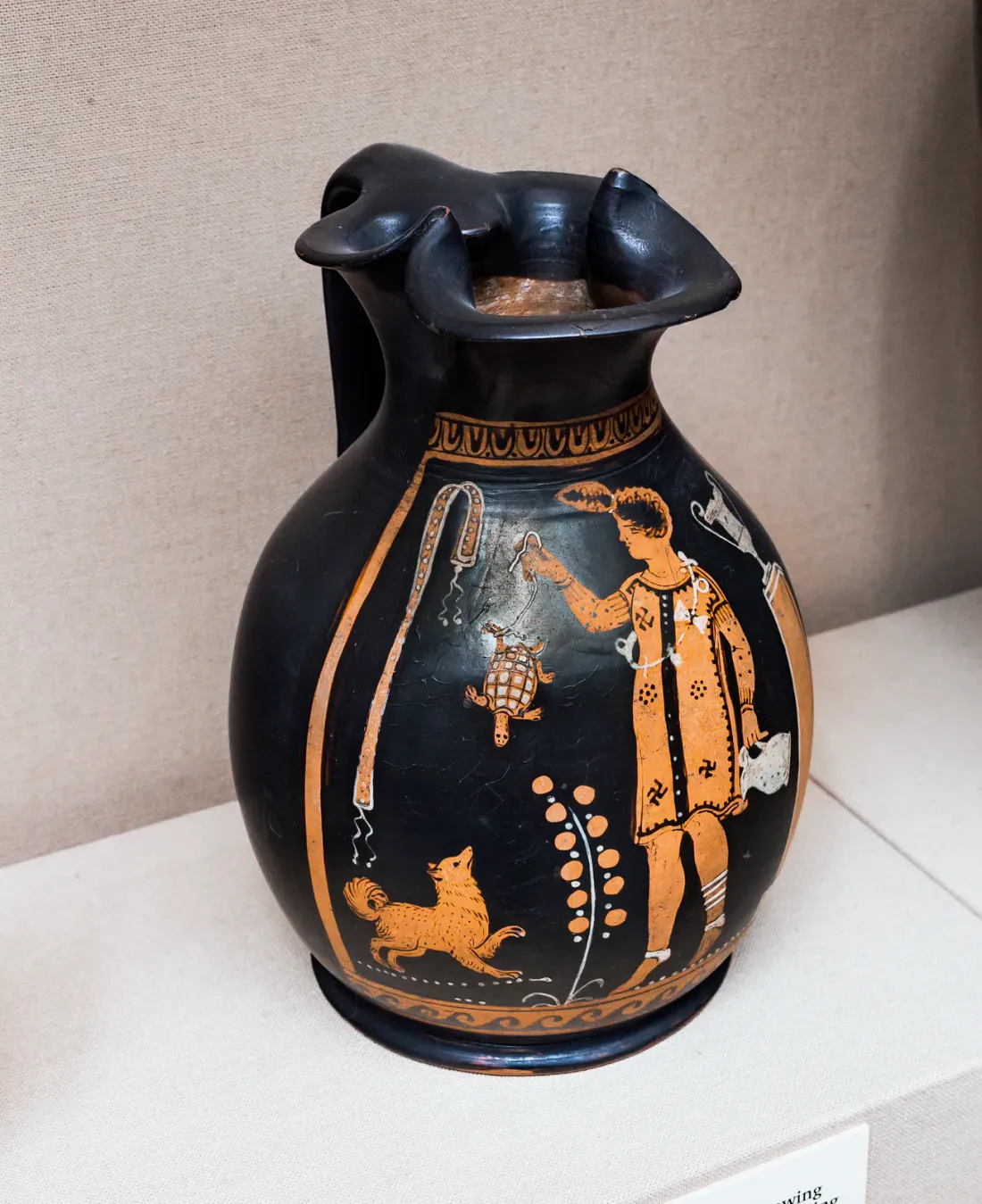 Girl playing with a tortoise and a small dog, Apulian vase, Paidagogos Group, 4th century BC