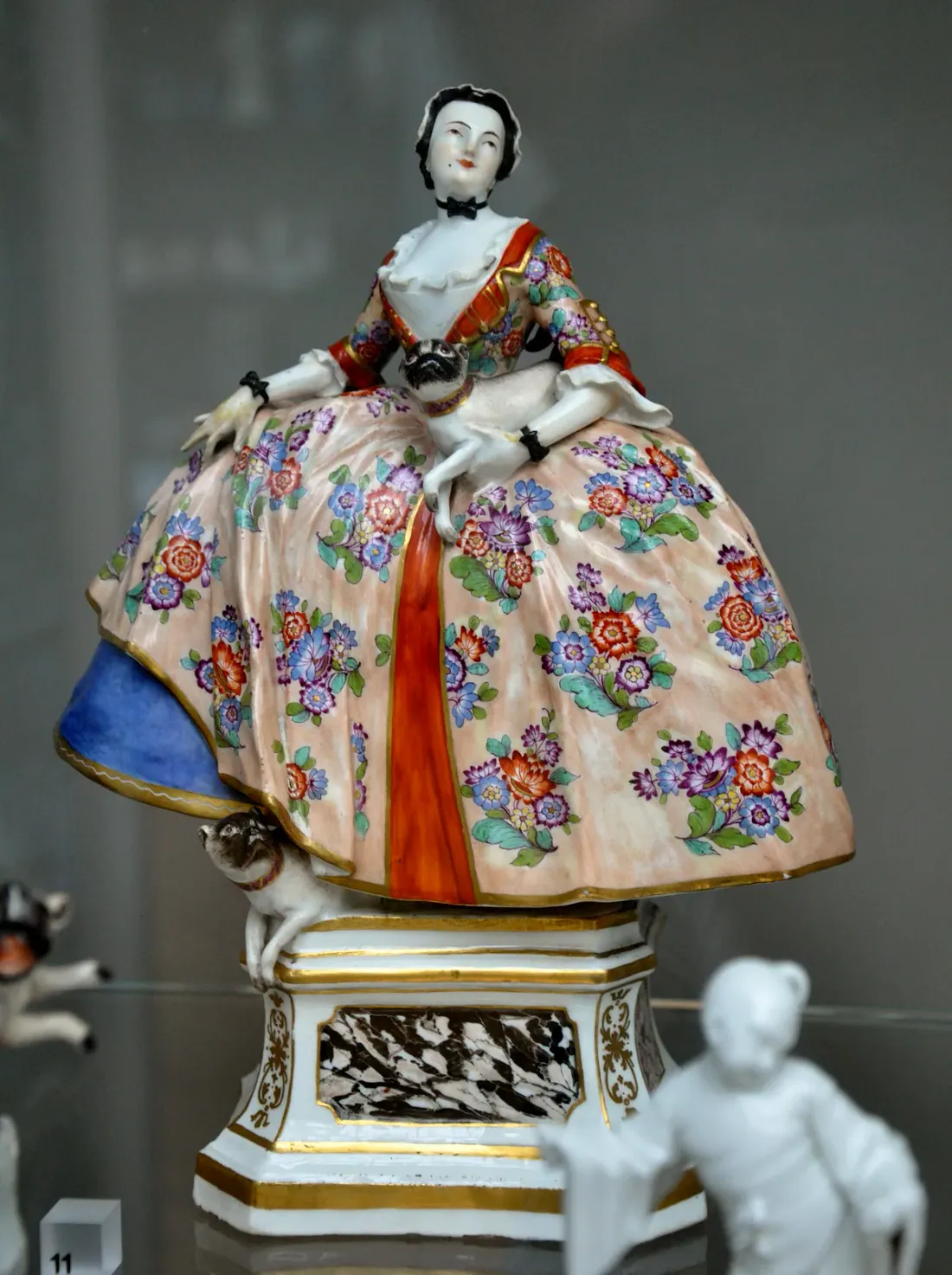 Meissen porcelain figure of a member of the Order of the Pug, 18th century